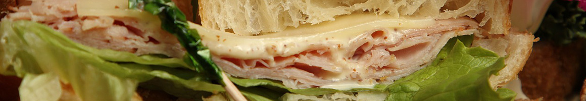 Eating Deli Sandwich at Momma Goldberg's Deli restaurant in LaGrange, GA.